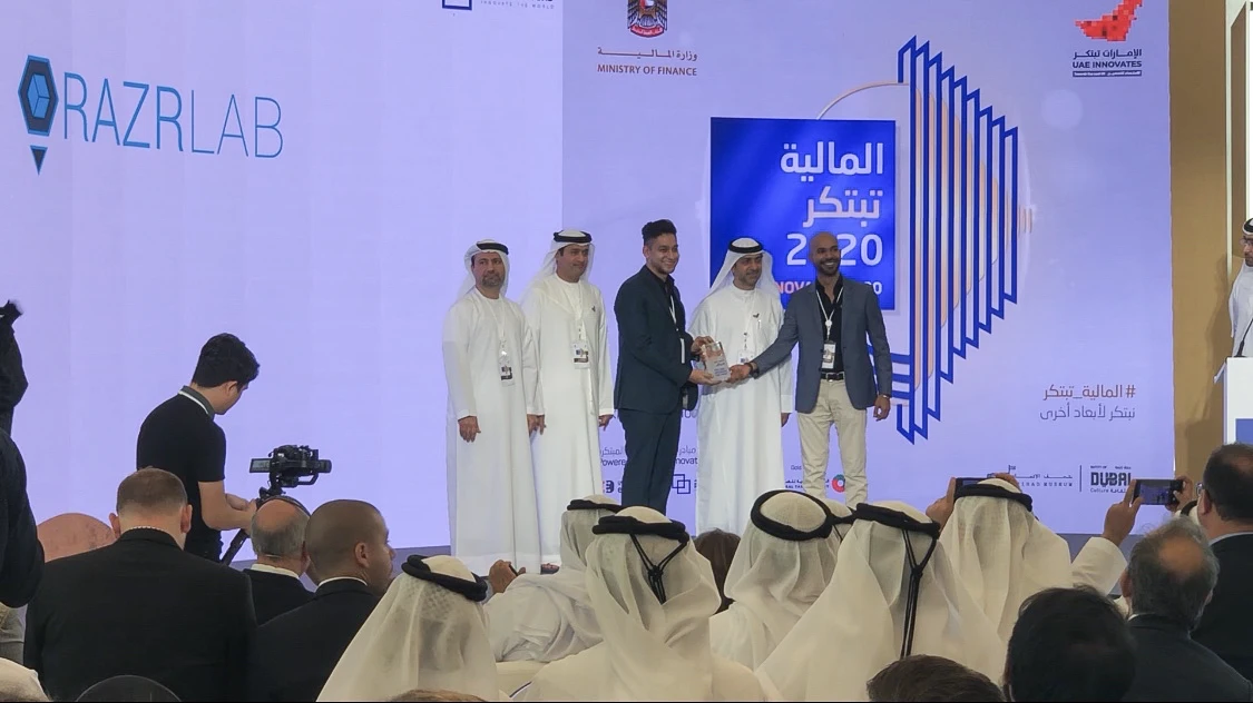 RAZRLAB receiving the MBRIF award on stage at UAE Innovates 2020